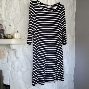 Sls below the knee navy & white strip jersey dress.